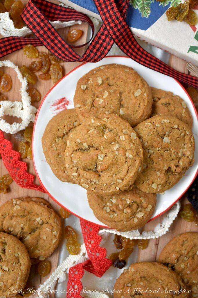 Buttery Oatmeal Raisin Molasses Spice Cookies - There’s nothing quite like biting into a soft, chewy molasses spice cookie, all warm with ginger, cinnamon, nutmeg, and cloves. But what if you were to take that classic comfort and give it a little twist? Picture all that cozy spice, but with the buttery chew of an oatmeal cookie and sweet golden raisins tucked into every bite. It’s like your favorite oatmeal raisin cookie and your go-to molasses spice cookie decided to team up and become the ultimate cookie duo. It’s the familiar comfort you crave, elevated into something entirely new and utterly addictive. If you love oatmeal raisin cookies, prepare to fall in love all over again.