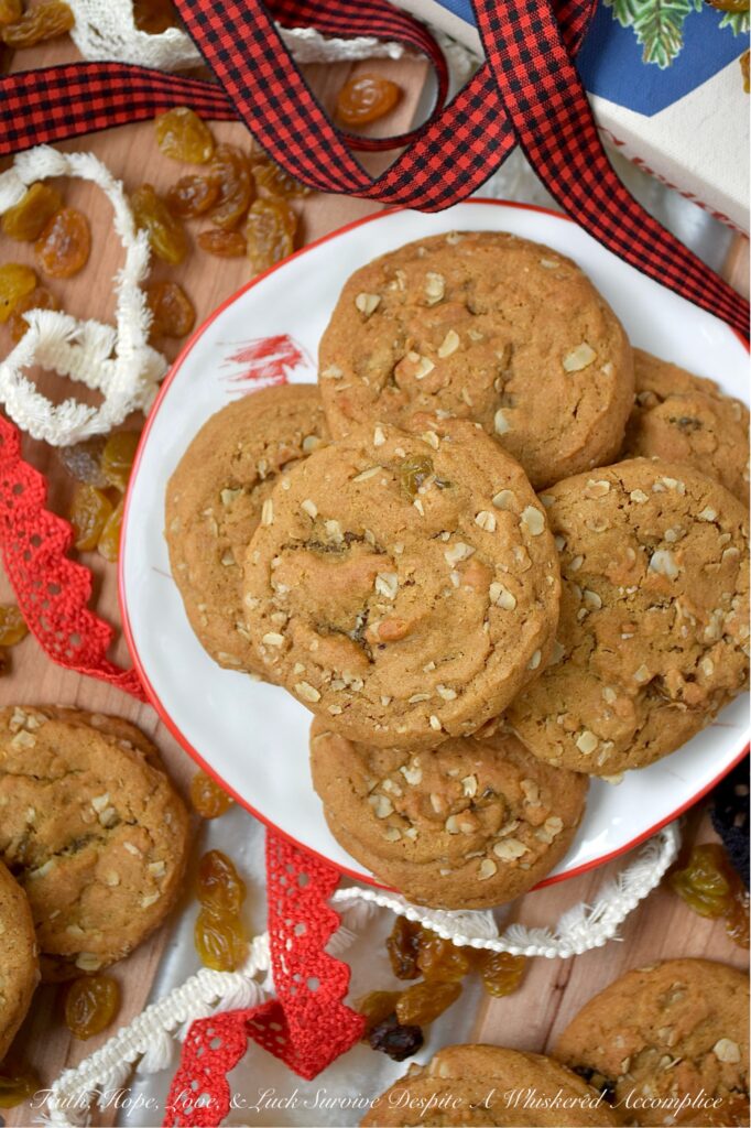 Buttery Oatmeal Raisin Molasses Spice Cookies - There’s nothing quite like biting into a soft, chewy molasses spice cookie, all warm with ginger, cinnamon, nutmeg, and cloves. But what if you were to take that classic comfort and give it a little twist? Picture all that cozy spice, but with the buttery chew of an oatmeal cookie and sweet golden raisins tucked into every bite. It’s like your favorite oatmeal raisin cookie and your go-to molasses spice cookie decided to team up and become the ultimate cookie duo. It’s the familiar comfort you crave, elevated into something entirely new and utterly addictive. If you love oatmeal raisin cookies, prepare to fall in love all over again.