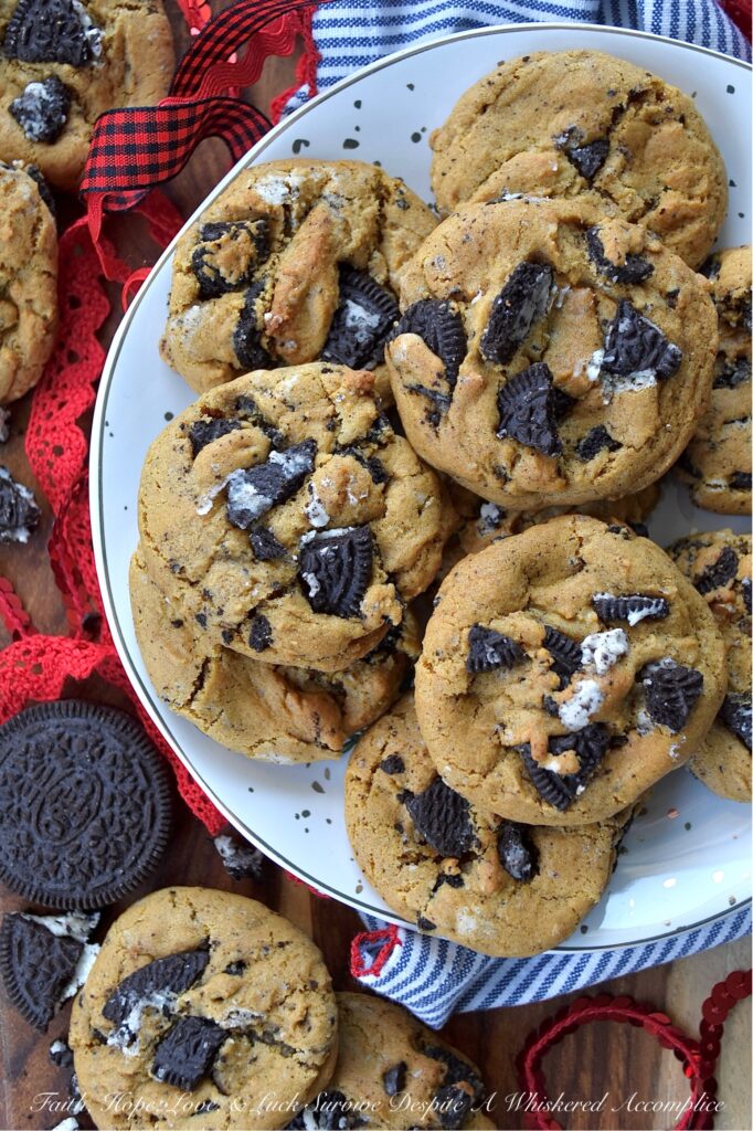 OREO Cookies & Cream Molasses Spice Cookies - What happens when the cozy, nostalgic warmth of your favorite molasses spice cookie meets the iconic, irresistible crunch of an OREO? Pure magic. If you’ve ever found yourself torn between the deep, molasses-rich flavor of a soft and chewy spice cookie and the chocolate-and-cream perfection of an OREO cookie, then prepare to have your mind blown. This cookie mashup brings the two legendary cookies together to create one spectacular recipe. These OREO Cookies & Cream Molasses Spice Cookies are packed with warm notes of ginger, cinnamon, nutmeg, and cloves, but with a rebellious, delightful twist. A generous helping of crushed OREO cookie pieces adds a lovely crunch you're bound to fall head over heels for at first bite. This is, without a doubt, a match made in cookie heaven.