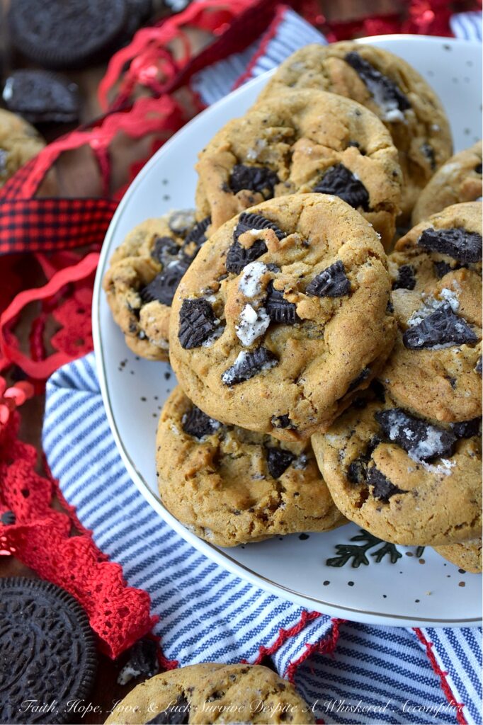 OREO Cookies & Cream Molasses Spice Cookies - What happens when the cozy, nostalgic warmth of your favorite molasses spice cookie meets the iconic, irresistible crunch of an OREO? Pure magic. If you’ve ever found yourself torn between the deep, molasses-rich flavor of a soft and chewy spice cookie and the chocolate-and-cream perfection of an OREO cookie, then prepare to have your mind blown. This cookie mashup brings the two legendary cookies together to create one spectacular recipe. These OREO Cookies & Cream Molasses Spice Cookies are packed with warm notes of ginger, cinnamon, nutmeg, and cloves, but with a rebellious, delightful twist. A generous helping of crushed OREO cookie pieces adds a lovely crunch you're bound to fall head over heels for at first bite. This is, without a doubt, a match made in cookie heaven.