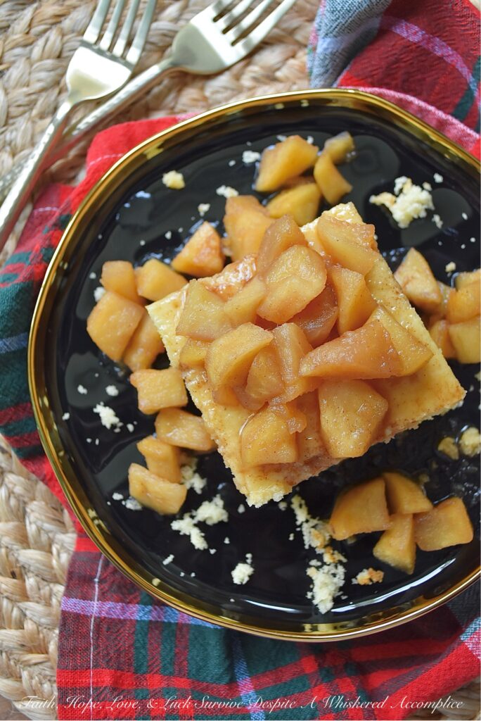 Butter Cake with Chunky Cinnamon Apples - This Butter Cake with Chunky Cinnamon Apples is effortlessly impressive, makes your kitchen smell like an autumn dream, and is proof that you don’t need to spend hours baking to create something truly fabulous. Imagine a tender, buttery sheet cake, made with a jazzed-up butter recipe cake mix, baked to absolute golden perfection. Served with a glorious layer of chunky, stovetop cinnamon apples, this simple cake is moist, flavorful, and everything you want on a crisp fall day. And since apples are always around, this is the kind of sweet treat you'll find yourself baking again and again, no matter the season.