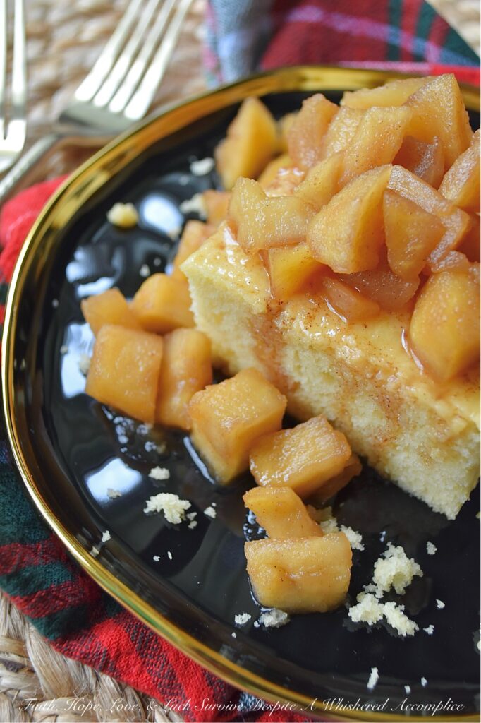 Butter Cake with Chunky Cinnamon Apples - This Butter Cake with Chunky Cinnamon Apples is effortlessly impressive, makes your kitchen smell like an autumn dream, and is proof that you don’t need to spend hours baking to create something truly fabulous. Imagine a tender, buttery sheet cake, made with a jazzed-up butter recipe cake mix, baked to absolute golden perfection. Served with a glorious layer of chunky, stovetop cinnamon apples, this simple cake is moist, flavorful, and everything you want on a crisp fall day. And since apples are always around, this is the kind of sweet treat you'll find yourself baking again and again, no matter the season.