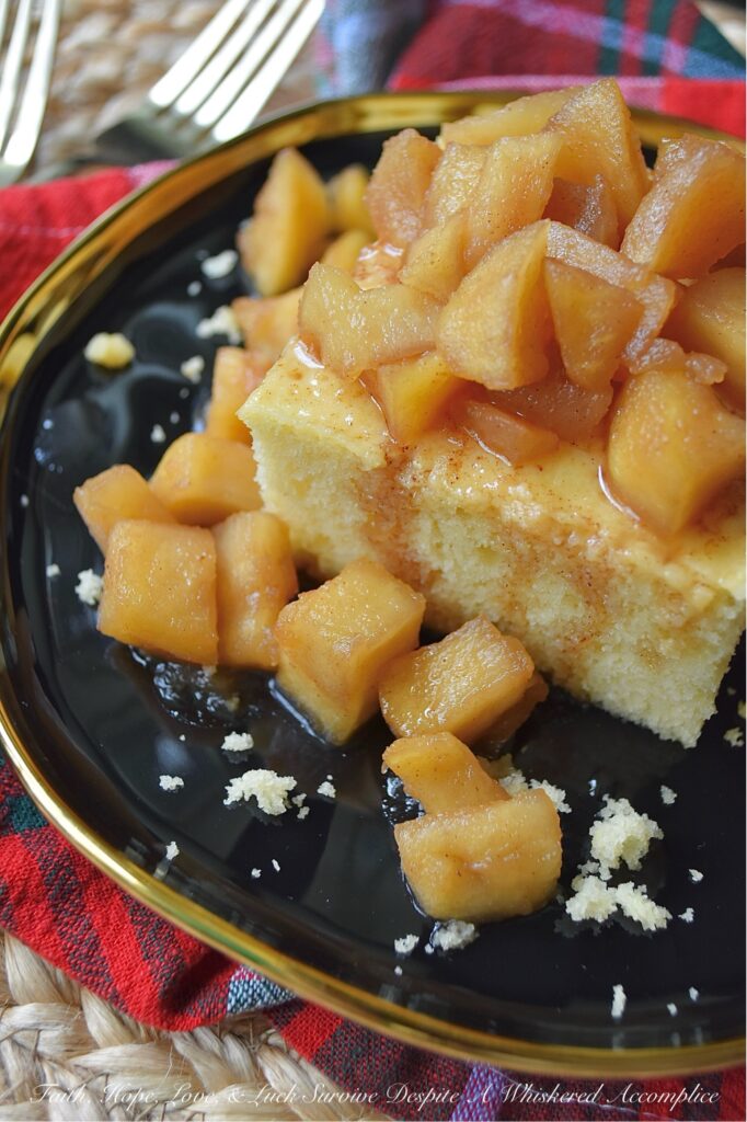 Butter Cake with Chunky Cinnamon Apples - This Butter Cake with Chunky Cinnamon Apples is effortlessly impressive, makes your kitchen smell like an autumn dream, and is proof that you don’t need to spend hours baking to create something truly fabulous. Imagine a tender, buttery sheet cake, made with a jazzed-up butter recipe cake mix, baked to absolute golden perfection. Served with a glorious layer of chunky, stovetop cinnamon apples, this simple cake is moist, flavorful, and everything you want on a crisp fall day. And since apples are always around, this is the kind of sweet treat you'll find yourself baking again and again, no matter the season.