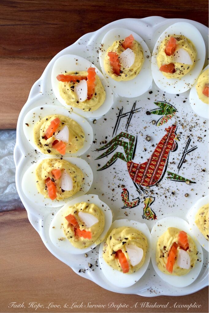 Yellow Mustard Seed Giardiniera Deviled Eggs - If you thought deviled eggs couldn’t get any more exciting, think again. These creamy, flavor-packed deviled eggs contain plump yellow mustard seeds, soaked in tangy giardiniera brine, which add a tangy, acidic burst of goodness and the most surprising pop of texture. Next, for a zesty punch, the eggs are garnished with thin slices of brightly pickled carrots and delicate pearl onion quarters. The final flourish is a peppery sprinkle of freshly grated black pepper. Y'all, these aren't your average deviled eggs. They're a showstopping appetizer that will have everyone practically begging for the recipe.