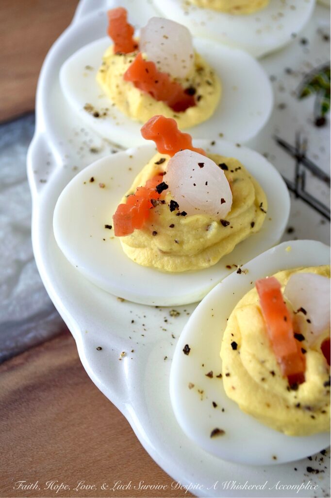 Yellow Mustard Seed Giardiniera Deviled Eggs - If you thought deviled eggs couldn’t get any more exciting, think again. These creamy, flavor-packed deviled eggs contain plump yellow mustard seeds, soaked in tangy giardiniera brine, which add a tangy, acidic burst of goodness and the most surprising pop of texture. Next, for a zesty punch, the eggs are garnished with thin slices of brightly pickled carrots and delicate pearl onion quarters. The final flourish is a peppery sprinkle of freshly grated black pepper. Y'all, these aren't your average deviled eggs. They're a showstopping appetizer that will have everyone practically begging for the recipe.