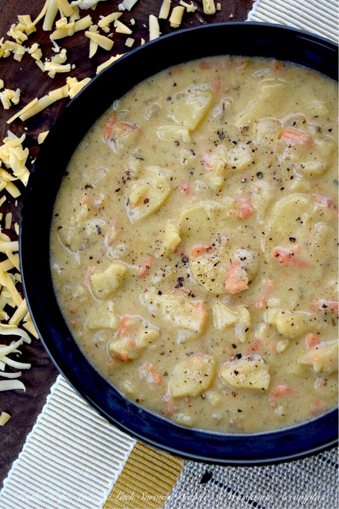 Sliced Yukon Gold Potato Beer Cheese Soup - Ever wonder what would happen if you combined a bowl of beer cheese soup with your favorite au gratin potatoes recipe? This Sliced Yukon Gold Potato Beer Cheese Soup, made with freshly grated Gouda and Cheddar, is the answer. It's a one-pot wonder that is gloriously cheesy, rich, and flavorful, as well as being a soul-warming soup that comes together in a flash. Whole yellow mustard seeds bring a little pop and crunch, while a generous sprinkle of mustard powder really amps up the flavor. And let’s not forget the bottle of lager, which adds just the right touch of malty sweetness. As for those Yukon Gold Potatoes, once they’re tender, they practically melt into the soup, giving you a dreamy, soft, pillowy, luxurious texture that’ll have you swooning at first bite.