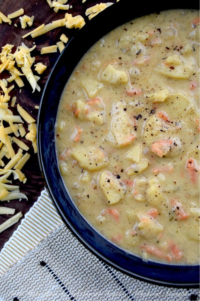 Sliced Yukon Gold Potato Beer Cheese Soup - Ever wonder what would happen if you combined a bowl of beer cheese soup with your favorite au gratin potatoes recipe? This Sliced Yukon Gold Potato Beer Cheese Soup, made with freshly grated Gouda and Cheddar, is the answer. It's a one-pot wonder that is gloriously cheesy, rich, and flavorful, as well as being a soul-warming soup that comes together in a flash. Whole yellow mustard seeds bring a little pop and crunch, while a generous sprinkle of mustard powder really amps up the flavor. And let’s not forget the bottle of lager, which adds just the right touch of malty sweetness. As for those Yukon Gold Potatoes, once they’re tender, they practically melt into the soup, giving you a dreamy, soft, pillowy, luxurious texture that’ll have you swooning at first bite.