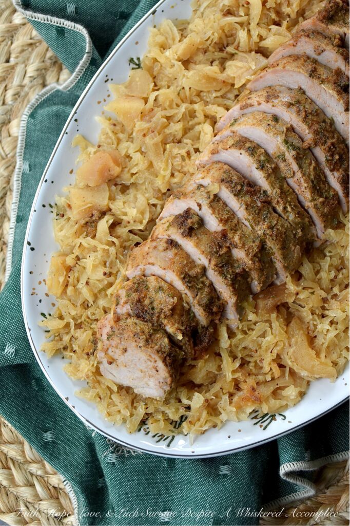 Baked Pork Tenderloins & Dried Apple Sauerkraut - This cozy, stick-to-your-ribs dinner practically makes itself. The pork tenderloins are nestled atop a flavorful bed of sweet and tangy sauerkraut, with little pops of finely chopped dried apples tucked in for good measure. After being baked to golden perfection, the tenderloins come out juicy and packed with flavor. And since everything is baked together in one large casserole dish, you can spend less time washing dishes and more time plotting how to snag that last piece of pork before anyone else does.
