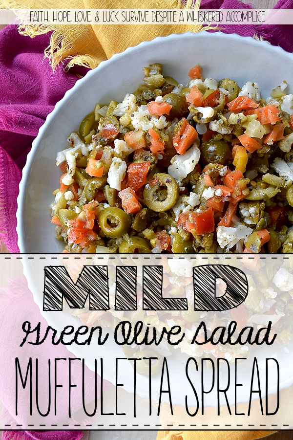 Mild Green Olive Salad Muffuletta Spread - Of course, this green olive salad is the classic go-to for muffuletta sandwiches, but it’s just as irresistible piled onto a hot, cheesy pizza, creamy deviled eggs, or simply scooped up or spread on a hunk of crusty bread. With buttery-soft green, ripe, pitted olives, mild giardiniera, and capers all mingling together in a simple red wine vinaigrette, you get a burst of flavor that’s big on taste but not on heat. Basically, this is the kind of condiment you’ll want to slather on just about every sandwich you make from here on out.