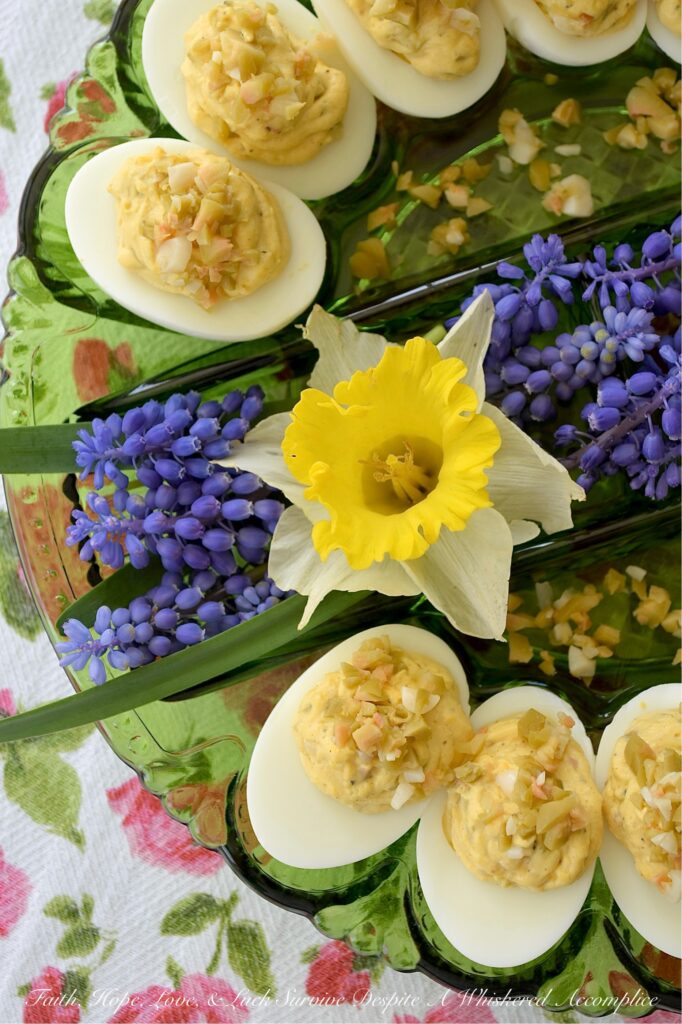 Chunky Garlic Stuffed Olive Deviled Eggs - There is a fine line between a good deviled egg and a truly great one, and that line is usually found in the garnish. What if one simple swap could make this appetizer the star of the show? The secret lies in the salty, briny pop of green olives, but with a slightly sophisticated twist. By using garlic-stuffed olives instead of the standard pimento-stuffed variety, you infuse every creamy bite with a delicate garlic punch that perfectly complements the chunky texture of these flavorful deviled eggs. It’s a small change that delivers a massive reward.