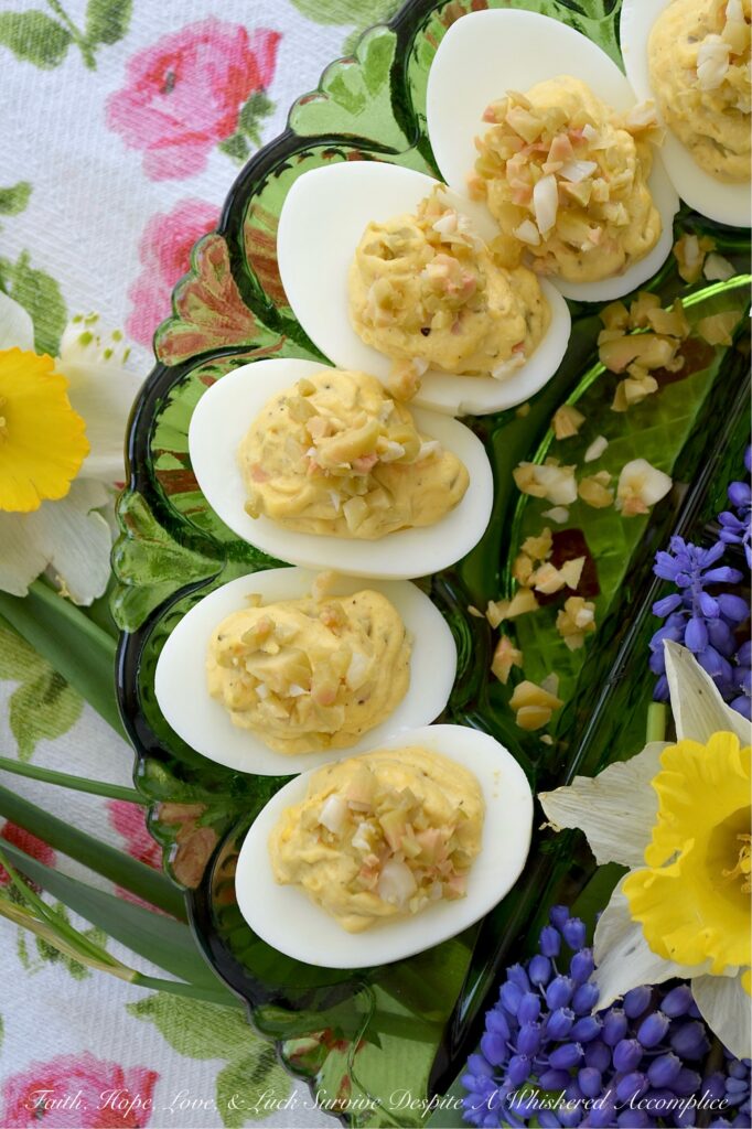 Chunky Garlic Stuffed Olive Deviled Eggs - There is a fine line between a good deviled egg and a truly great one, and that line is usually found in the garnish. What if one simple swap could make this appetizer the star of the show? The secret lies in the salty, briny pop of green olives, but with a slightly sophisticated twist. By using garlic-stuffed olives instead of the standard pimento-stuffed variety, you infuse every creamy bite with a delicate garlic punch that perfectly complements the chunky texture of these flavorful deviled eggs. It’s a small change that delivers a massive reward.