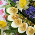 Chunky Garlic Stuffed Olive Deviled Eggs - There is a fine line between a good deviled egg and a truly great one, and that line is usually found in the garnish. What if one simple swap could make this appetizer the star of the show? The secret lies in the salty, briny pop of green olives, but with a slightly sophisticated twist. By using garlic-stuffed olives instead of the standard pimento-stuffed variety, you infuse every creamy bite with a delicate garlic punch that perfectly complements the chunky texture of these flavorful deviled eggs. It’s a small change that delivers a massive reward.