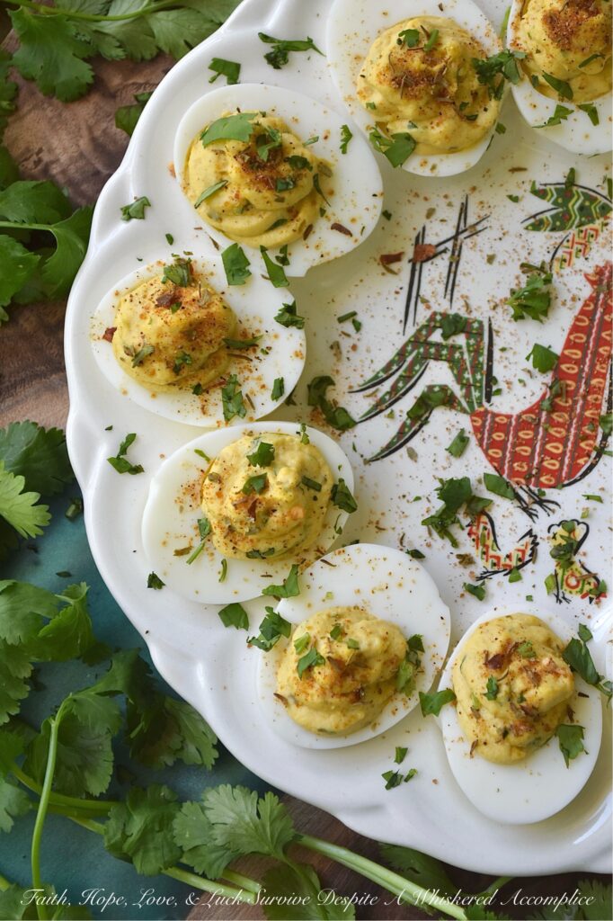 Caribbean Honey Mustard Deviled Eggs - These Caribbean-inspired deviled eggs have serious personality. They’re pretty much a tropical vacation on a platter. With an easy-to-make homemade jerk seasoning paired with a creamy, tangy honey-mustard twist, these Caribbean Honey Mustard Deviled Eggs deliver a perfect sweet-meets-spicy punch. Easy to whip up and impossible to put down, this appetizer is about to become the most talked-about dish at your next gathering.