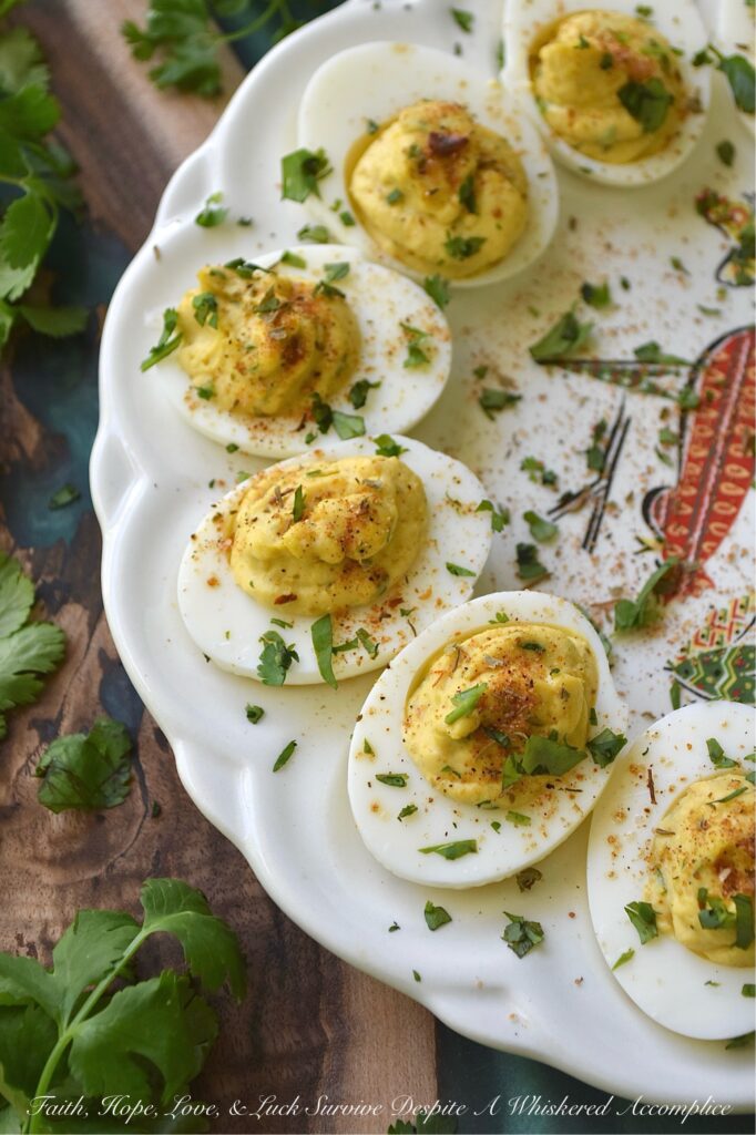 Caribbean Honey Mustard Deviled Eggs - These Caribbean-inspired deviled eggs have serious personality. They’re pretty much a tropical vacation on a platter. With an easy-to-make homemade jerk seasoning paired with a creamy, tangy honey-mustard twist, these Caribbean Honey Mustard Deviled Eggs deliver a perfect sweet-meets-spicy punch. Easy to whip up and impossible to put down, this appetizer is about to become the most talked-about dish at your next gathering.