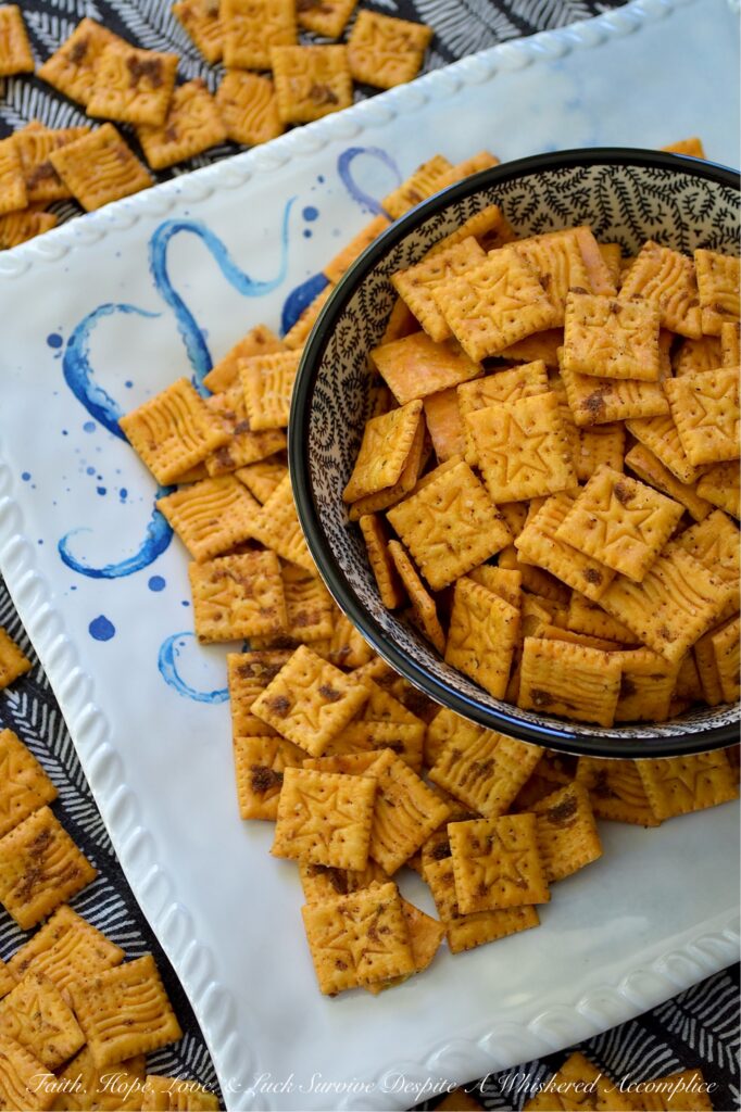 Sweet & Spicy Jerk Seasoned Cheez-It Crackers - Let’s be honest, placing a box of crackers in a bowl is the ultimate, "I tried, but not really." party move. But with a handful of spices and a little bit of time in the oven, you can transform that same box of crackers from an emergency snack into a dangerously addictive nibble. These Sweet & Spicy Jerk Seasoned Cheez-it Crackers have a bold Caribbean-inspired crunch that hits every flavor note: savory, cheesy, spicy, and perfectly sweet. Fair warning, once you put out the bowl, it’s going to disappear fast.