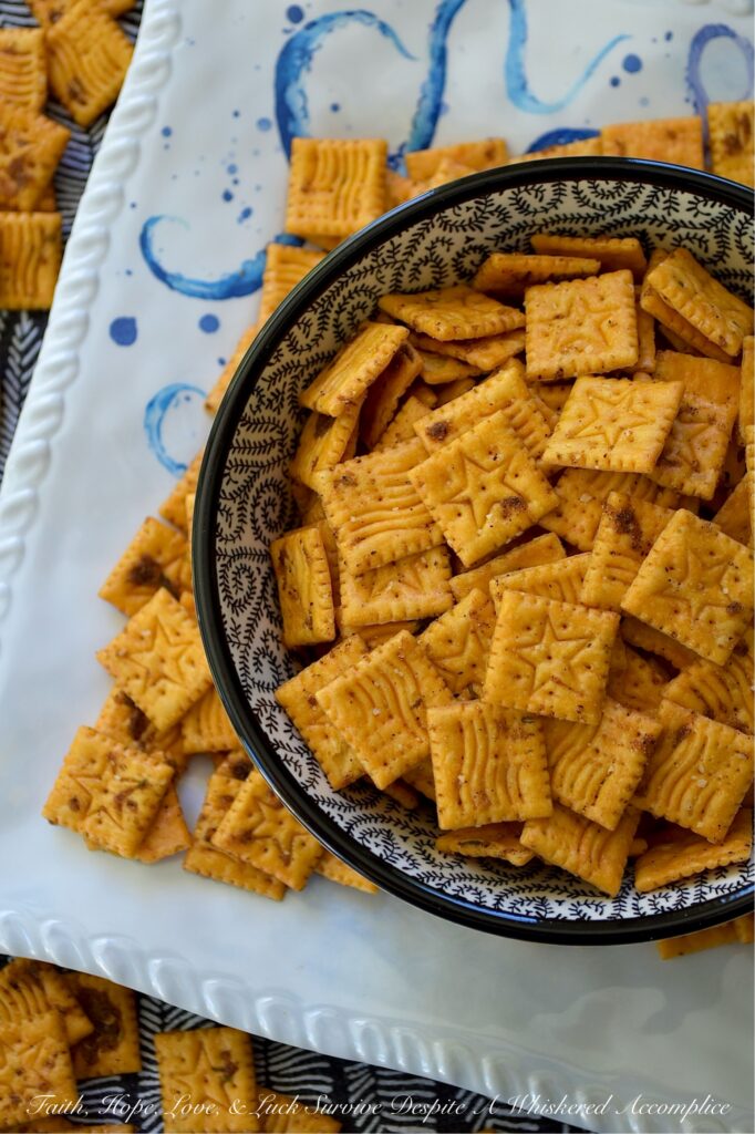 Sweet & Spicy Jerk Seasoned Cheez-It Crackers - Let’s be honest, placing a box of crackers in a bowl is the ultimate, "I tried, but not really." party move. But with a handful of spices and a little bit of time in the oven, you can transform that same box of crackers from an emergency snack into a dangerously addictive nibble. These Sweet & Spicy Jerk Seasoned Cheez-it Crackers have a bold Caribbean-inspired crunch that hits every flavor note: savory, cheesy, spicy, and perfectly sweet. Fair warning, once you put out the bowl, it’s going to disappear fast.