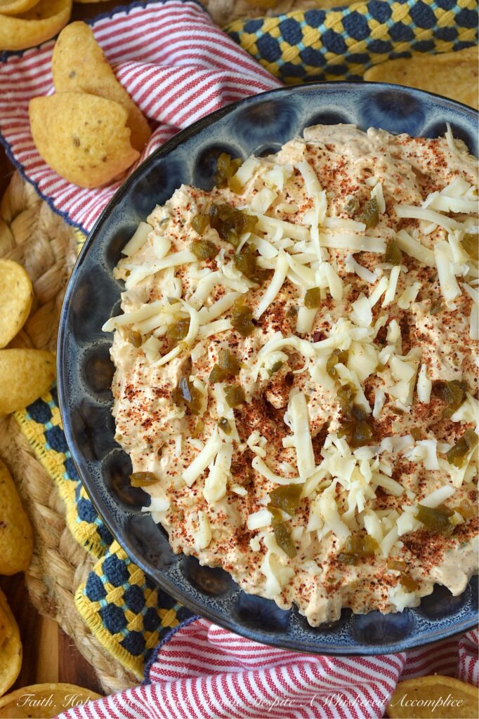 Smoky Southwestern Pepper Jack Cheese Dip - This smoky southwestern pepper jack cheese dip is everything a great appetizer should be. Creamy, cheesy, dangerously addictive, and packed with spicy, smoky flavor that keeps everyone coming back for just one more scoop. With the perfect amount of smokiness and a kick of heat from freshly grated pepper jack and candied jalapeños, it’s the kind of dip that disappears almost the second it hits the table. Best of all? It’s completely customizable. If you live for the fire, go heavy on the jalapeños; if you prefer a gentler warmth, use less. Either way, serve it up with a mountain of salty corn chips and watch it disappear in minutes.
