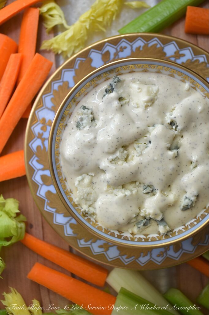 Simple No-Herb Blue Cheese Dressing & Dip - When you're looking for a super-simple recipe that takes just a minute or two to make and packs tons of blue cheese flavor, this recipe is it. With a base of mayonnaise and half and half, you can easily whip up a tasty dressing or dip any day of the week. A little bit of extra-hot mustard, a splash of apple cider vinegar, and a healthy dash of salt and pepper are all you need. No funky ingredients like the store-bought versions, and perfect for use as either a creamy salad dressing or a flavorful dip for your favorite snacks.