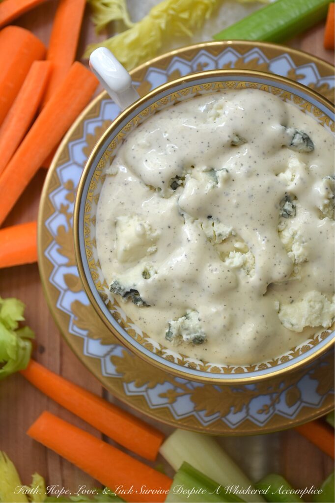 Simple No-Herb Blue Cheese Dressing & Dip - When you're looking for a super-simple recipe that takes just a minute or two to make and packs tons of blue cheese flavor, this recipe is it. With a base of mayonnaise and half and half, you can easily whip up a tasty dressing or dip any day of the week. A little bit of extra-hot mustard, a splash of apple cider vinegar, and a healthy dash of salt and pepper are all you need. No funky ingredients like the store-bought versions, and perfect for use as either a creamy salad dressing or a flavorful dip for your favorite snacks.
