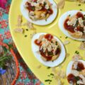 BBQ Deviled Eggs with Crispy Fried Onions - Stop treating crispy fried onions like a holiday guest. Think beyond green bean casserole. With the perfect balance of smoky flavor, creamy filling, and a satisfying, salty crunch in every bite, these BBQ Deviled Eggs topped with fresh chives and crispy fried onions are about to become the star appetizer of your next gathering. Whether you're hosting a game day or looking for the ultimate potluck dish, these bite-sized barbeque-flavored snacks are guaranteed to disappear in minutes.
