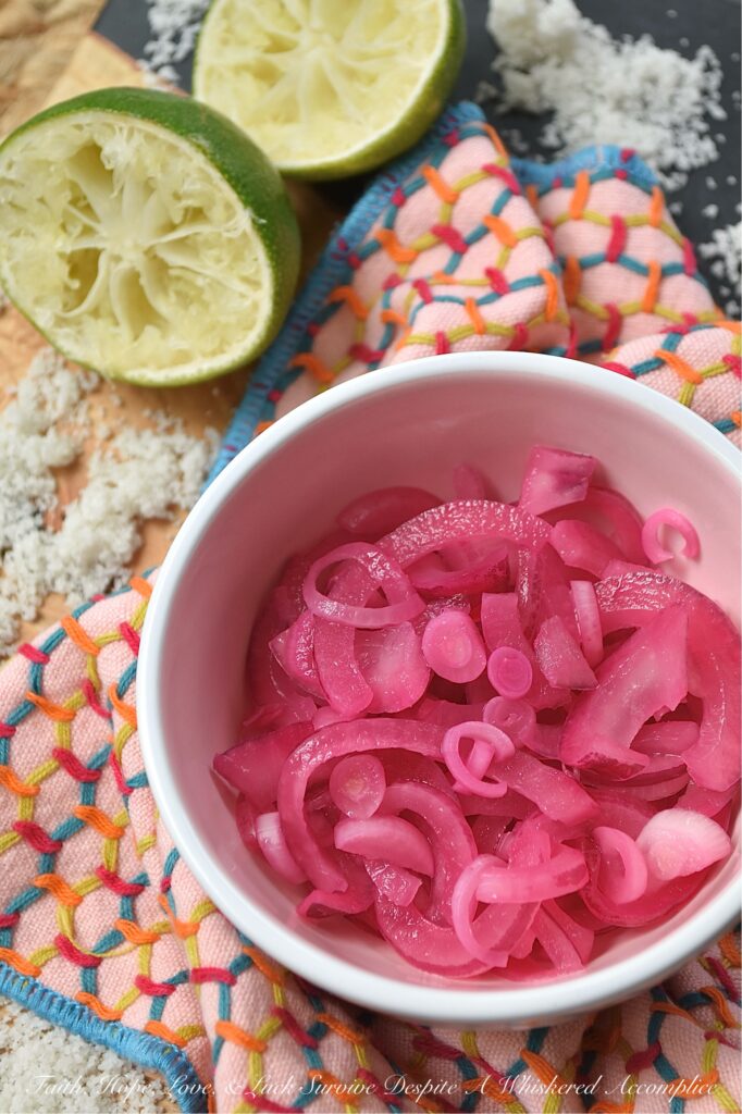 3-Ingredient Lime Juice Pickled Red Onions - With these 3-Ingredient Lime Juice Pickled Red Onions, you're three ingredients away from adding tremendous flavor to almost everything you eat. Whether you're folding these salty, tangy pickled red onions into a pasta or potato salad, layering them on a loaded sandwich, or sneaking them straight from the jar, these almost-effortless, vibrant, perfectly crisp lime juice pickled red onions are about to become your new absolute favorite. And to think, all you need is one red onion, one lime, and a little bit of sea salt.