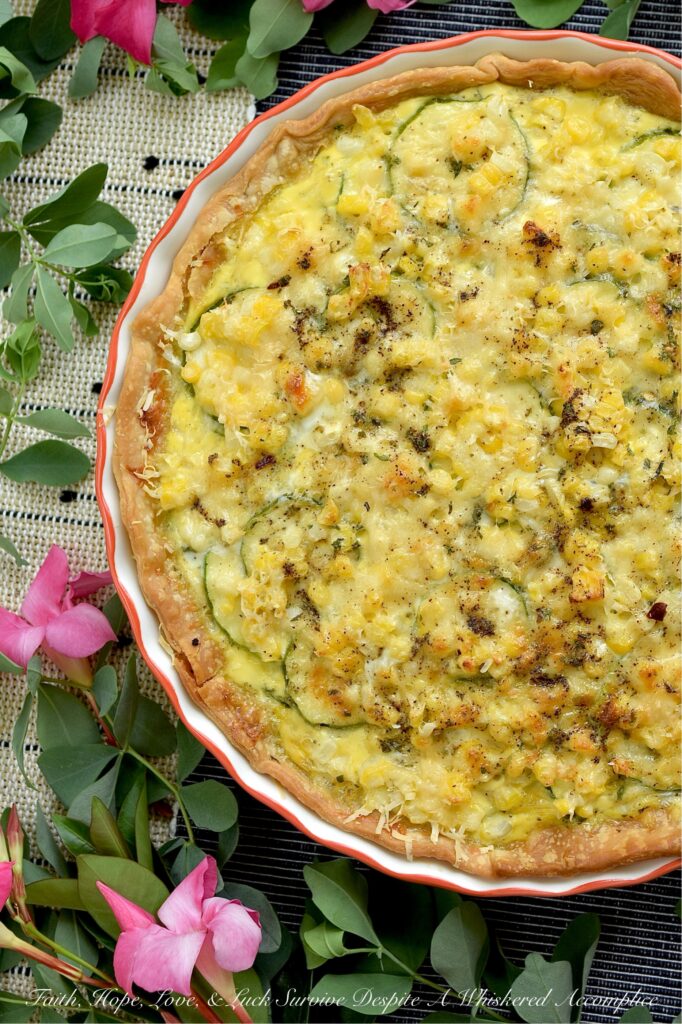 Fresh Summer Corn & Zucchini Sausage Quiche - Bursting with sweet fresh corn cut straight from the cob, thinly sliced zucchini, savory sausage, Italian herb seasoning, and a rich blend of sharp white cheddar and parmesan cheese, this isn’t your average quiche. It’s creamy, it’s hearty, and best of all, the veggies actually keep their fresh, satisfying bite. Whether you’re serving it up for a lazy weekend breakfast, a light brunch or lunch, or an easy weeknight dinner casserole, this is a rich, flavorful slice of summer guaranteed to hit the spot.