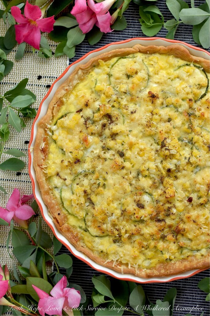Fresh Summer Corn & Zucchini Sausage Quiche - Bursting with sweet fresh corn cut straight from the cob, thinly sliced zucchini, savory sausage, Italian herb seasoning, and a rich blend of sharp white cheddar and parmesan cheese, this isn’t your average quiche. It’s creamy, it’s hearty, and best of all, the veggies actually keep their fresh, satisfying bite. Whether you’re serving it up for a lazy weekend breakfast, a light brunch or lunch, or an easy weeknight dinner casserole, this is a rich, flavorful slice of summer guaranteed to hit the spot.