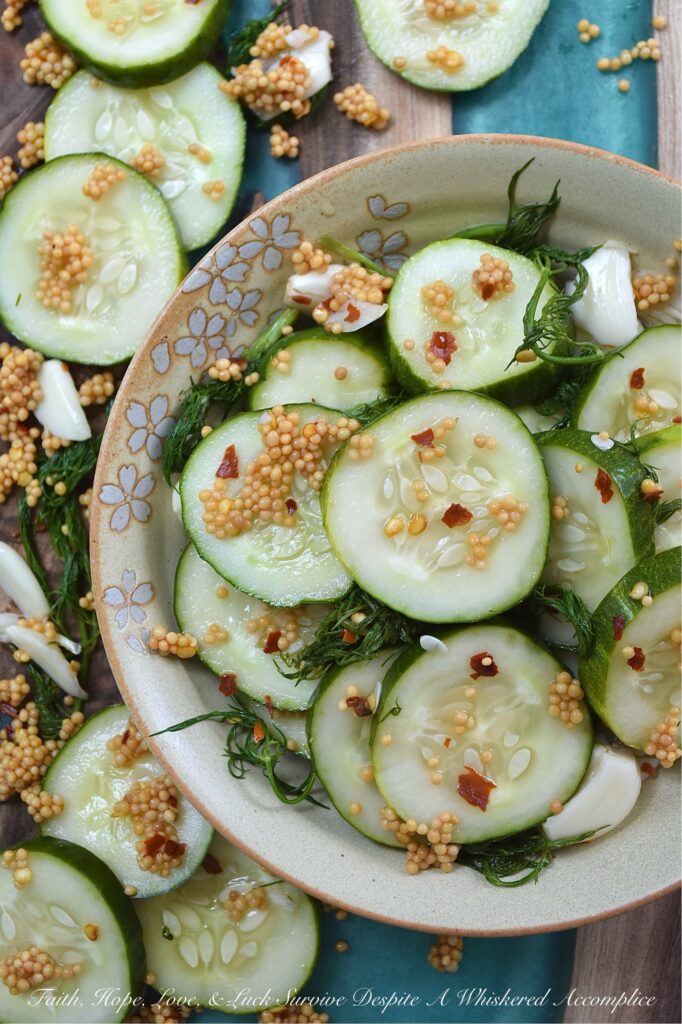 Spicy Quick-Pickled Dill Cucumbers with Garlic - In just a few minutes, you can assemble a spicy jar of garlic and dill quick pickles that taste fresher, crunchier, and infinitely better than anything you'll find sitting on a grocery store shelf. Just layer, cover with brine, shake, and let the fridge work its magic for a few hours. These spicy quick-pickled dill cucumbers with garlic will stay fresh for up to a week in the fridge, that is, assuming they even make it past day one. No fancy canning equipment and no melting over a hot stove in the middle of summer.