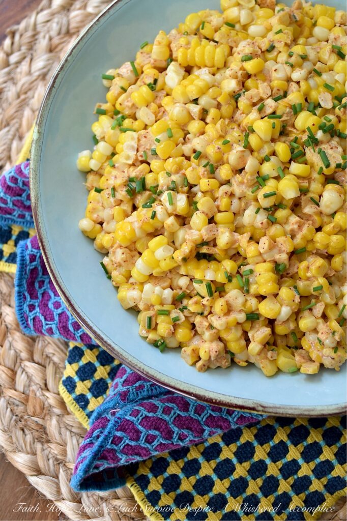 Smoky Southwestern Corn Salad with Chives - This fresh corn salad features a perfectly balanced homemade southwestern seasoning blend made with smoked paprika and warm coriander to bring lots of lovely smoky flavor without adding too much heat. When combined with just a little bit of mayonnaise, a hint of heavy cream, and a splash of vinegar, this seasoning blend creates a slightly sweet, smoky, tangy sauce that's effortlessly delicious. And with its colorful green pop of fresh chives, this flavorful side dish hits pretty much every flavor note without feeling too heavy.