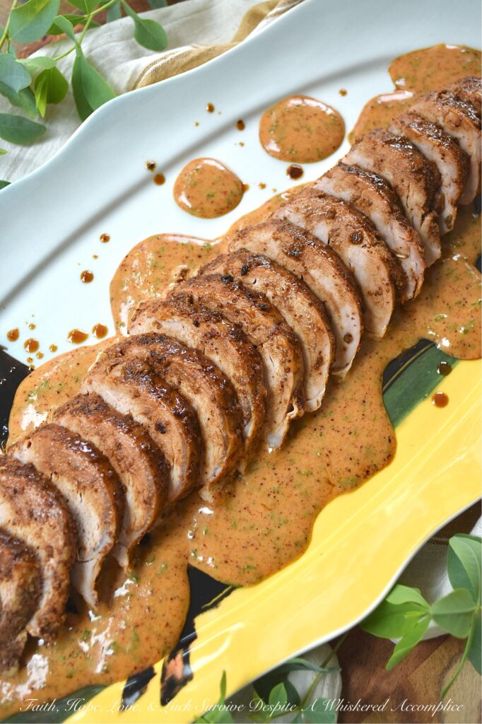 Southwestern Honey Mustard Pork Tenderloin - The secret to this tender, melt-in-your-mouth pork tenderloin is a simple homemade smoky southwestern seasoning mix. First, it creates an incredible, savory crust as the meat roasts to tender perfection in the oven. Then, it's used to whip up an addictive sweet-and-savory honey mustard sauce. Best of all? This pork is as versatile as it is delicious. Serve it sliced over a bed of fluffy rice, creamy mashed potatoes, or pasta for a cozy sit-down dinner, or use it to make the ultimate lunchtime sandwich or wrap. And as a bonus, you'll have enough smoky southwestern seasoning and honey mustard sauce for at least two pork tenderloins, because trust us, your family is definitely going to want to have leftovers.