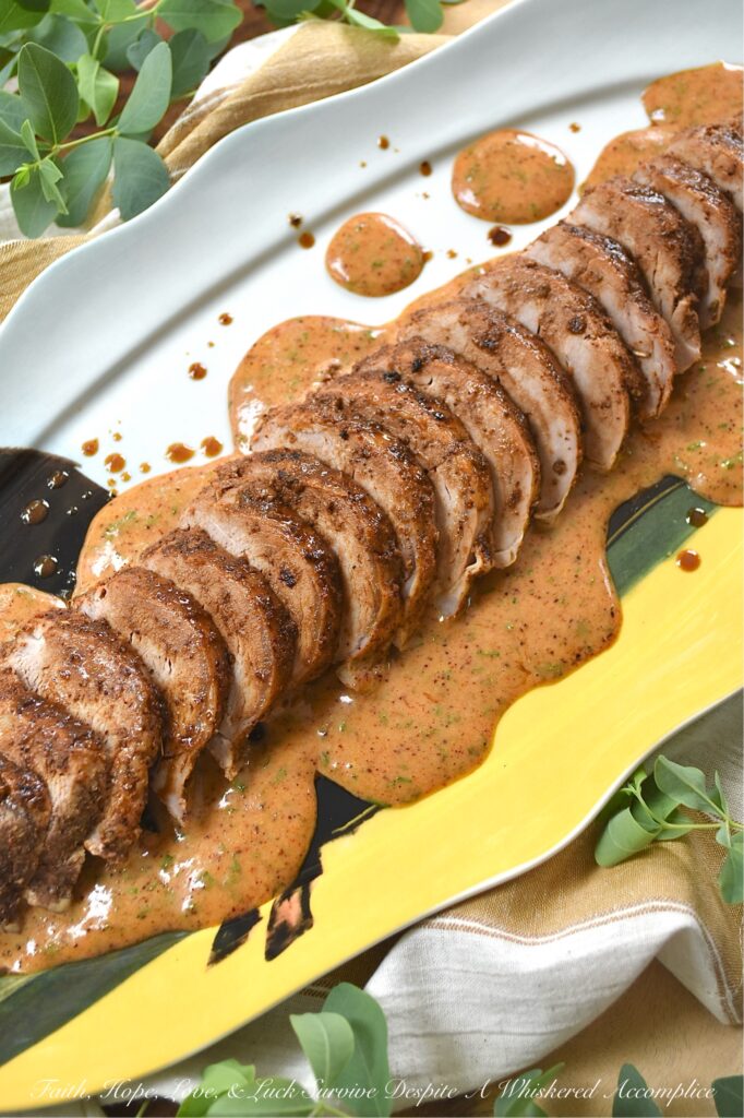 Southwestern Honey Mustard Pork Tenderloin - The secret to this tender, melt-in-your-mouth pork tenderloin is a simple homemade smoky southwestern seasoning mix. First, it creates an incredible, savory crust as the meat roasts to tender perfection in the oven. Then, it's used to whip up an addictive sweet-and-savory honey mustard sauce. Best of all? This pork is as versatile as it is delicious. Serve it sliced over a bed of fluffy rice, creamy mashed potatoes, or pasta for a cozy sit-down dinner, or use it to make the ultimate lunchtime sandwich or wrap. And as a bonus, you'll have enough smoky southwestern seasoning and honey mustard sauce for at least two pork tenderloins, because trust us, your family is definitely going to want to have leftovers.