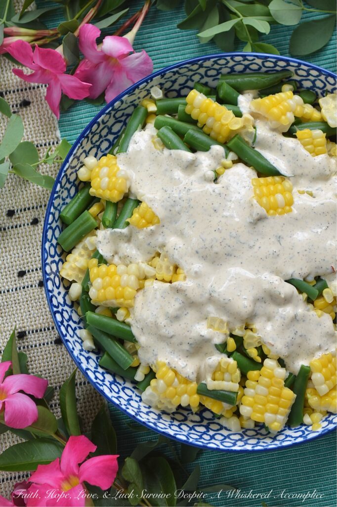 Creamy Italian Ranch Corn & Green Bean Salad - Bursting with fresh seasonal vegetables, packed with satisfying crunch, and tossed in a homemade dressing that marries zesty Italian seasoning with creamy ranch goodness, every crunchy bite of this fresh corn and green bean summer salad delivers ultimate flavor. If you’re obsessed with ranch dressing, Italian seasoning, and farm-fresh summer veggies, you'll simply adore this creamy corn and green bean salad.