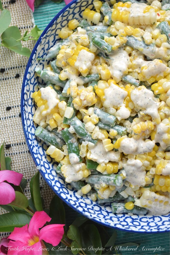 Creamy Italian Ranch Corn & Green Bean Salad - Bursting with fresh seasonal vegetables, packed with satisfying crunch, and tossed in a homemade dressing that marries zesty Italian seasoning with creamy ranch goodness, every crunchy bite of this fresh corn and green bean summer salad delivers ultimate flavor. If you’re obsessed with ranch dressing, Italian seasoning, and farm-fresh summer veggies, you'll simply adore this creamy corn and green bean salad.