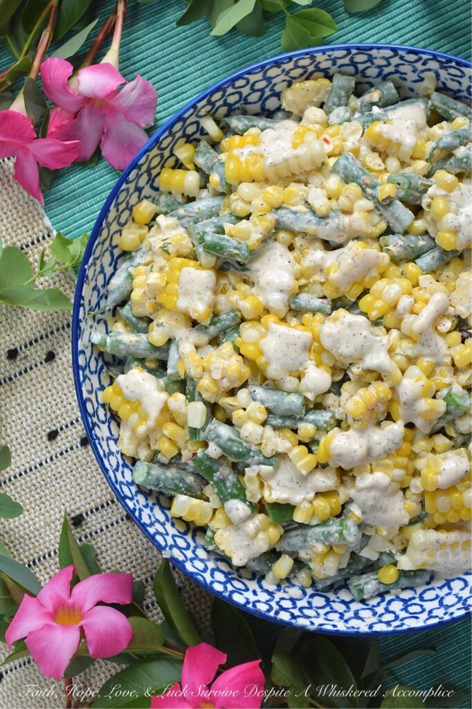 Creamy Italian Ranch Corn & Green Bean Salad - Bursting with fresh seasonal vegetables, packed with satisfying crunch, and tossed in a homemade dressing that marries zesty Italian seasoning with creamy ranch goodness, every crunchy bite of this fresh corn and green bean summer salad delivers ultimate flavor. If you’re obsessed with ranch dressing, Italian seasoning, and farm-fresh summer veggies, you'll simply adore this creamy corn and green bean salad.