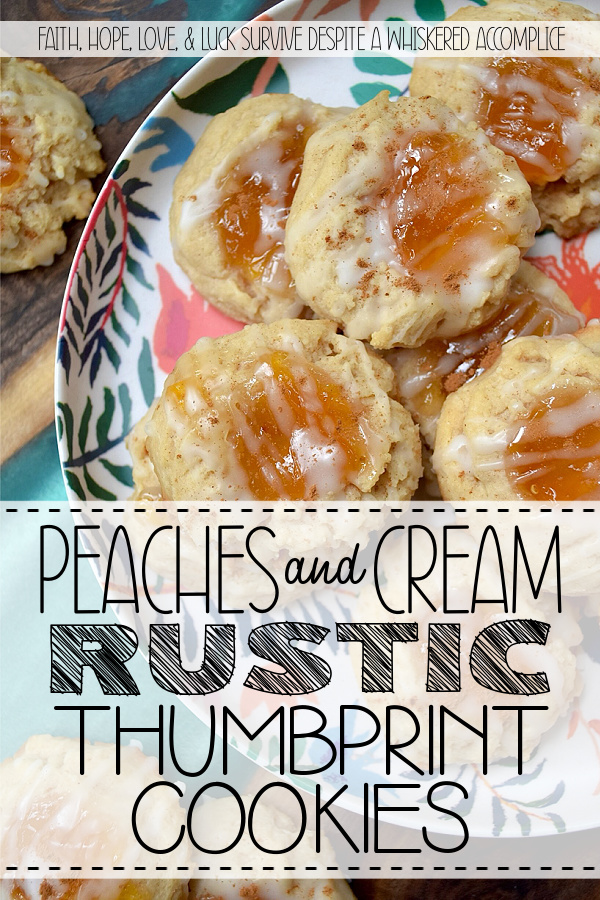 Peaches and Cream Rustic Thumbprint Cookies - Craving a taste of summer all year long? These buttery, fruity cream cheese thumbprint cookies are pretty much sunshine in a bite. With a gooey peach preserves center, a splash of peach schnapps in the icing, and enough cinnamon warmth to add just the right amount of spice, these peaches and cream rustic thumbprint cookies are addictively dangerous. Whether you’re pairing them with morning coffee or evening tea, these jammy cookies are proof that summer never really has to end.