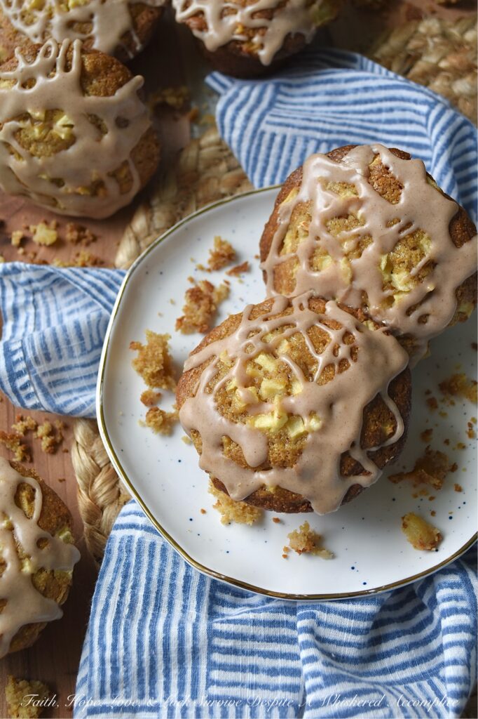 Apple Cornbread Muffins with Cinnamon Icing - Studded with crisp, fresh diced red apples and drizzled with sweet cinnamon powdered sugar icing, these apple cornbread muffins are the perfect morning pick-me-up. But don’t let the sweet icing fool you. These delicious fruit-filled cornbread muffins are just as at home tucked beside a steaming bowl of savory chili or soup as they are served alongside your morning coffee or tea. And while you could leave the icing off for dinner, let’s be honest, why would you ever want to?