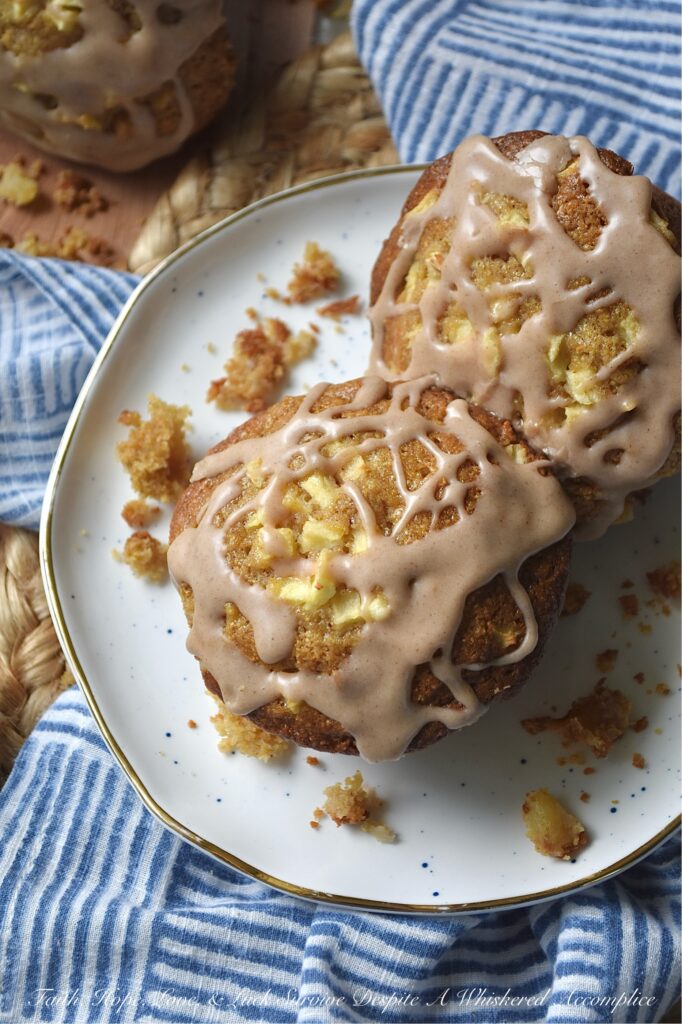 Apple Cornbread Muffins with Cinnamon Icing - Studded with crisp, fresh diced red apples and drizzled with sweet cinnamon powdered sugar icing, these apple cornbread muffins are the perfect morning pick-me-up. But don’t let the sweet icing fool you. These delicious fruit-filled cornbread muffins are just as at home tucked beside a steaming bowl of savory chili or soup as they are served alongside your morning coffee or tea. And while you could leave the icing off for dinner, let’s be honest, why would you ever want to?