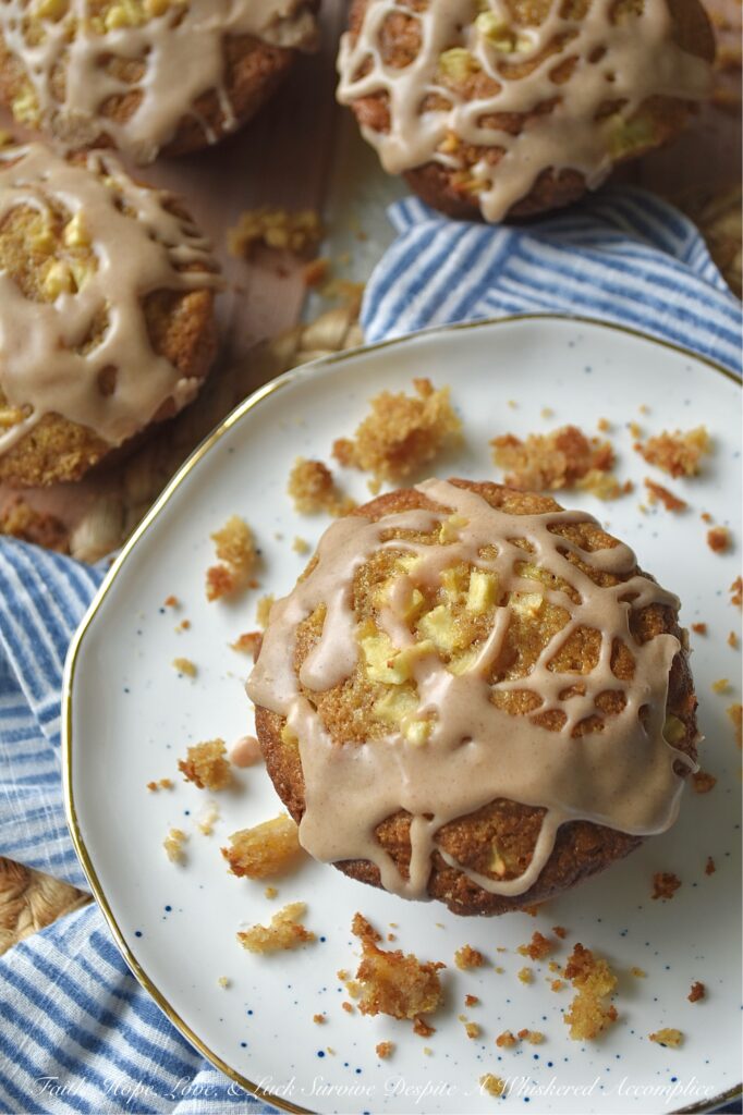 Apple Cornbread Muffins with Cinnamon Icing - Studded with crisp, fresh diced red apples and drizzled with sweet cinnamon powdered sugar icing, these apple cornbread muffins are the perfect morning pick-me-up. But don’t let the sweet icing fool you. These delicious fruit-filled cornbread muffins are just as at home tucked beside a steaming bowl of savory chili or soup as they are served alongside your morning coffee or tea. And while you could leave the icing off for dinner, let’s be honest, why would you ever want to?
