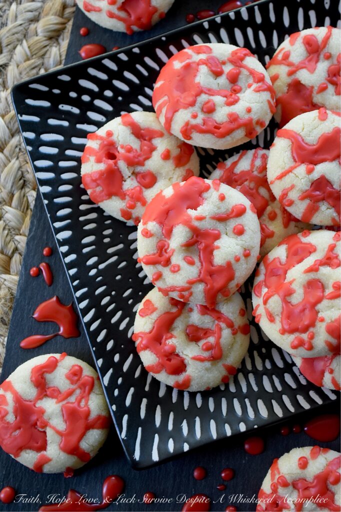 Blood Splatter Halloween Vanilla Sugar Cookies - Whether you’re hosting a spooktastic Halloween party or just want to thrill the little monsters after school on an October evening, these sugar cookies are guaranteed to be a bloody good time. Featuring a quick and easy dough that requires no chilling, these festive cookies are wonderfully kid-friendly and an absolute blast to decorate. Edible horror has never looked or tasted so good.