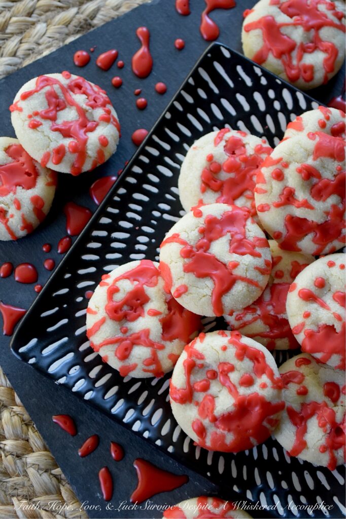 Blood Splatter Halloween Vanilla Sugar Cookies - Whether you’re hosting a spooktastic Halloween party or just want to thrill the little monsters after school on an October evening, these sugar cookies are guaranteed to be a bloody good time. Featuring a quick and easy dough that requires no chilling, these festive cookies are wonderfully kid-friendly and an absolute blast to decorate. Edible horror has never looked or tasted so good.