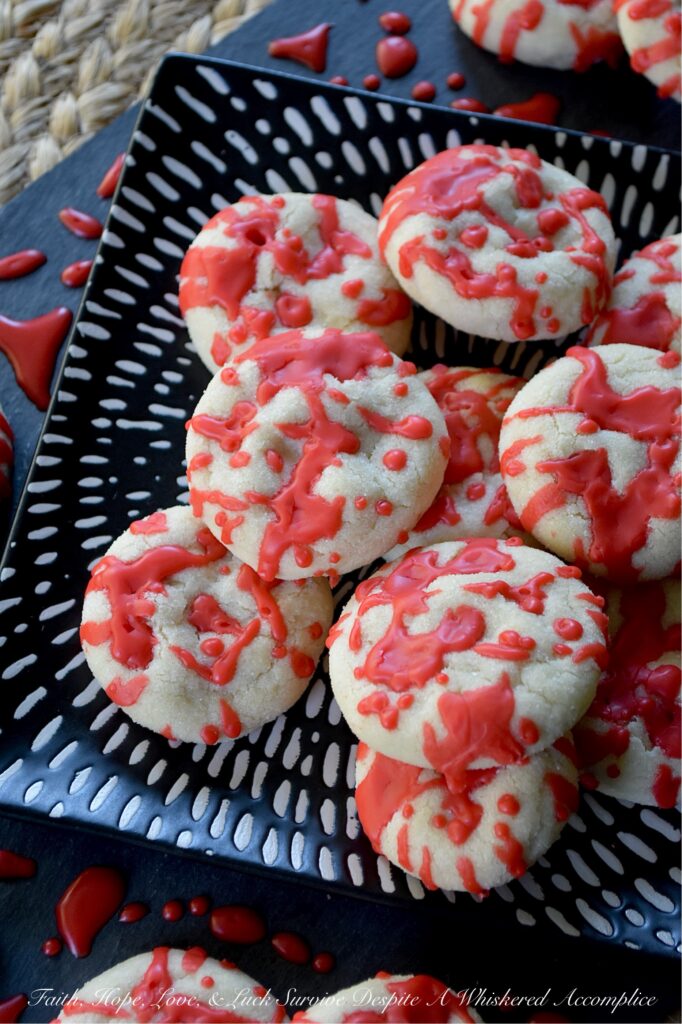 Blood Splatter Halloween Vanilla Sugar Cookies - Whether you’re hosting a spooktastic Halloween party or just want to thrill the little monsters after school on an October evening, these sugar cookies are guaranteed to be a bloody good time. Featuring a quick and easy dough that requires no chilling, these festive cookies are wonderfully kid-friendly and an absolute blast to decorate. Edible horror has never looked or tasted so good.