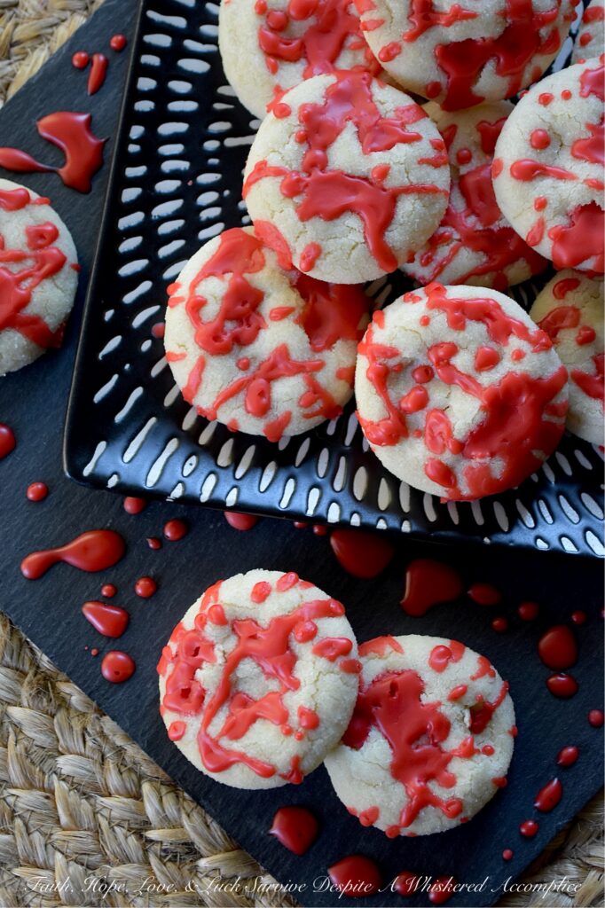 Blood Splatter Halloween Vanilla Sugar Cookies - Whether you’re hosting a spooktastic Halloween party or just want to thrill the little monsters after school on an October evening, these sugar cookies are guaranteed to be a bloody good time. Featuring a quick and easy dough that requires no chilling, these festive cookies are wonderfully kid-friendly and an absolute blast to decorate. Edible horror has never looked or tasted so good.