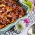 Spinach and Four-Cheese Stuffed Shells - This spinach and four-cheese stuffed shells Italian pasta dish is the perfect recipe to serve for a large family dinner, especially if you're trying to get your family to eat more spinach. After all, it's pretty hard to resist a baked pasta dish, topped with perfectly browned ooey-gooey cheese and crisp pepperoni.
