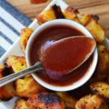 Twice Cooked Potatoes with Spicy Ketchup - Tired of the same boring potato side dishes, week after week? Craving a potato recipe with a bit more pizzazz? These twice-cooked potatoes are boiled to fluffy perfection, then roasted to a golden crisp, before finally being drizzled with and served alongside a ridiculously addictive spicy ketchup jazzed up with brown sugar, vinegar, and a fiery kick of hot sauce. These heavenly boiled and roasted potatoes are sure to have you licking your plate clean.