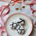 Mexican Chocolate Chip Crinkle Cookies - A hint of cinnamon and spice make these traditional Christmas chocolate chip crinkle cookies coated in powdered sugar a real holiday treat.