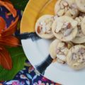Almond & Orange Glazed Shortbread Cookies - A few teaspoons of orange extract in both the dough and glaze of these almond-topped buttery shortbread cookies helps to give these delicate glazed shortbread cookies a lovely orange flavor that is not too overwhelming or overly-sweet.