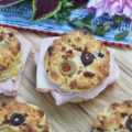 Olive & Feta Cheese Ham Biscuits - These southern ham biscuits are given a unique Mediterranean twist with the addition of olives and feta cheese. Whether you eat them for breakfast, lunch, or dinner, you're sure to enjoy these flavorful crumbly and buttery biscuit sandwiches.