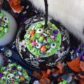 Halloween Sprinkle Cauldron Cupcakes - What can make Halloween any better than it already is? Sprinkles, of course. Especially when they're loaded on top of chocolate cupcakes with cream cheese frosting. These are the type of Halloween cauldrons your kids will definitely go crazy for, and they'll also help you clean out that sprinkle drawer or cabinet that's beginning to get a bit out of hand.