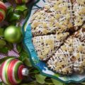 Vanilla Glazed Gingerbread Scones - Most people think of cookies when they hear the word gingerbread, however, gingerbread is a flavor that works fantastically with all sorts of delicious holiday baked goods, like these flavorful gingerbread scones. After being drizzled with a vanilla glaze, and then garnished with finely chopped crystallized ginger, these scones become quite the festive Christmas breakfast or dessert treat.