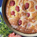 Sweet Strawberry Honey Cornbread Cake - This honey-flavored cast iron cornbread cake is full of sweet strawberries and topped with just the right amount of powdered sugar drizzle. Whether you choose to serve it for breakfast alongside a banana or additional sliced strawberries, or for dessert alongside fresh whipped cream or a scoop of ice cream, I guarantee that you'll fall absolutely in love with this sweet cornbread after the very first bite.